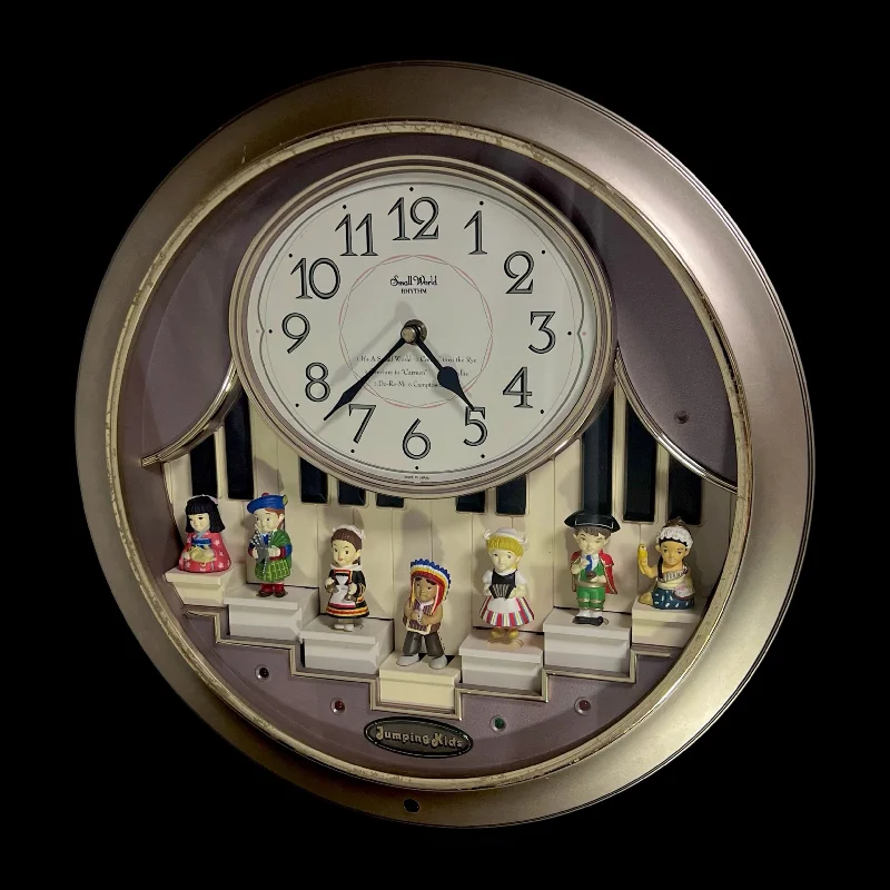 Rhythm “Jumping Kids” Magic Motion Musical Wall Clock with Moving Figurines and Piano Keys - 4MH721RH18