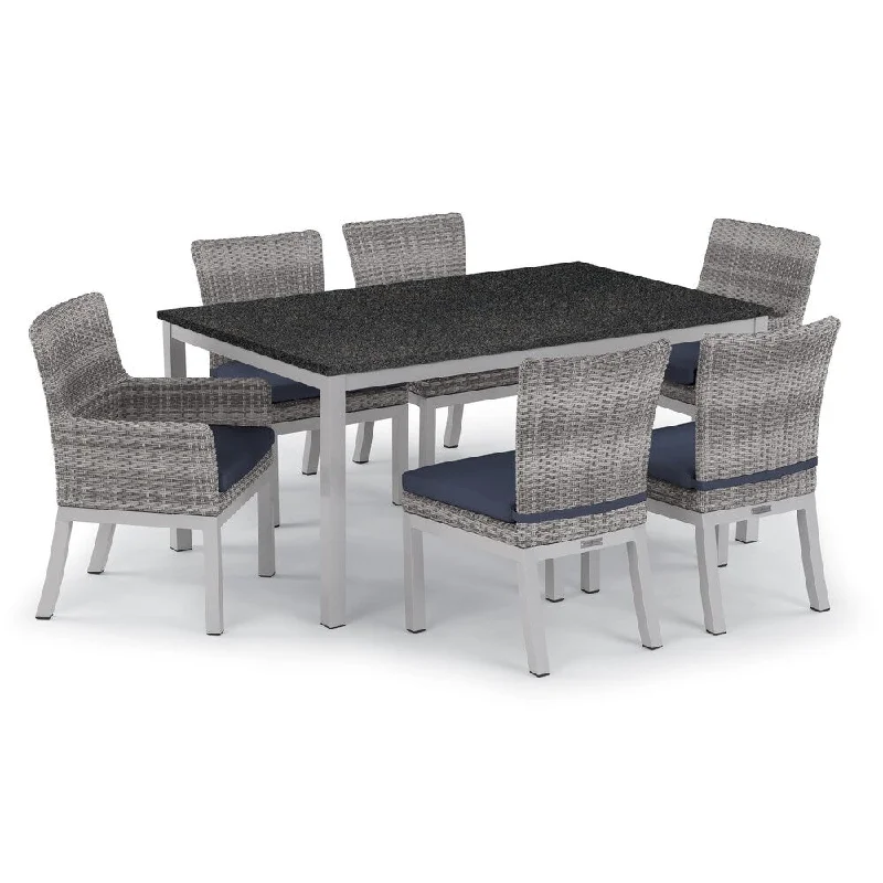 Oxford Garden Travira 7-piece 63-in x 40-in Lite-Core Table & Argento Resin Wicker Arm & Side Chair Set - Midnight Blue Cushions