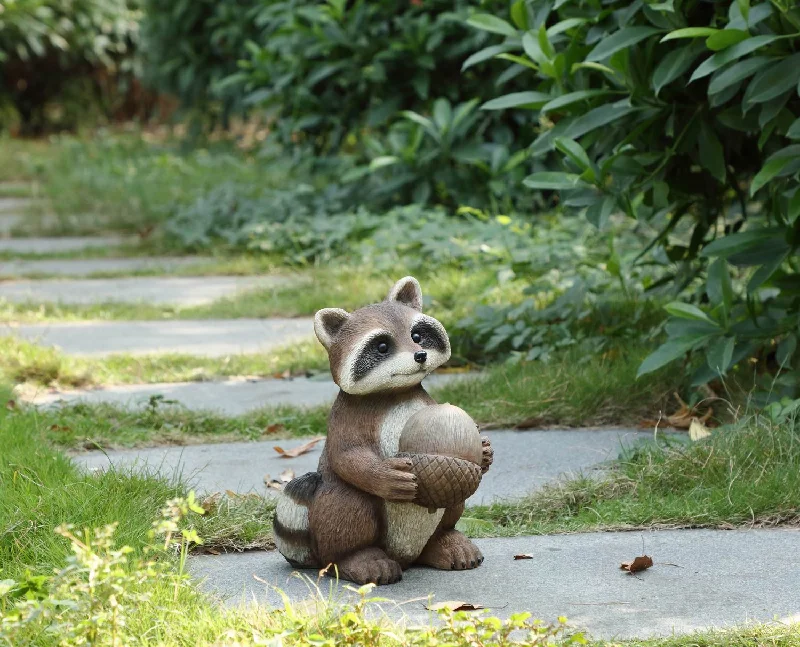 Racoon Holding Acorn Statue