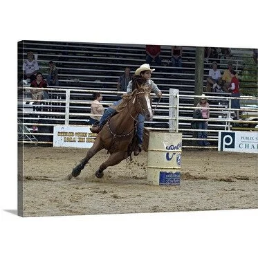 Premium Thick-Wrap Canvas entitled Cowgirl barrel racing at rodeo. Annual July 4th event. Small town. Arcadia, Florida,