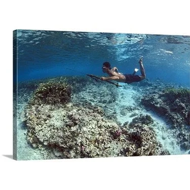 Premium Thick-Wrap Canvas entitled Local villager spearfishing underwater, Salud Archipelago, Indonesia